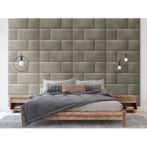 Wandgestaltung mit Textilpaneelen Inari 26 Sand Struktur 30x60 cm hinter einem Bett.