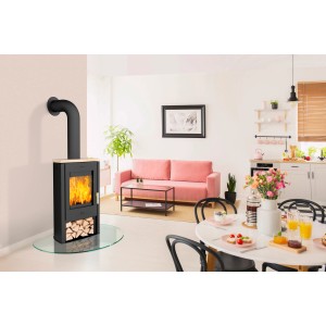 Fireplace Tuvalu Kaminofen, 6 kW, Sandstein, Schwarz. Zeitbrandofen im Wohnraum.