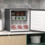 Grauer HOMCOM Mini-Gefrierschrank 35L mit offener, umkehrbarer Tür, gefüllt mit Tiefkühlkost. Kompakt für Küche.