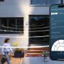 Bosch Eyes II Außenkamera in Silber mit App-Steuerung und Bewegungserkennung im Garten.