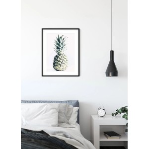 Komar Wandbild Pineapple, 40x50 cm, im Schlafzimmer. Ananas-Motiv im schwarzen Rahmen.