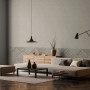 Wohnraum mit grauer Marburg Vliestapete Shades Iconic 10 mit grafischem Muster.