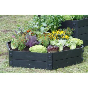 Anthrazitfarbener KHW Komposter-Aufbausatz (250 l) mit Bepflanzung im Garten.