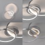 Moderne LED-Deckenleuchte Asmina von Just Light aus Aluminium, 69x55 cm, mit verschlungenen Ringen.