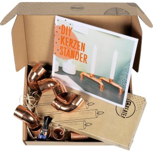CREATE! by OBI DIY Kerzenständer Set mit Kupferrohren und Zubehör in geöffneter Box.