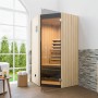Weka Infrarotkabine Tanilla Eck mit Linienstrahler im Badezimmer mit Glasfront und Holzverkleidung.