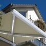 Home Deluxe LED Vollkassettenmarkise, 500x300 cm, sandfarben, mit Windsensor.