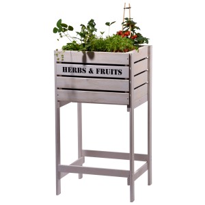 Weißes Dobar Hochbeet Obstkiste aus Holz mit Kräutern und Erdbeeren.