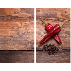 2er-Set Glasabdeckplatten „Pepper“ für Glaskeramik-Kochfelder mit Chili-Motiv.