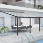 Moderne Palram Canopia Olympia Terrassenüberdachung, 3x5.5 m, Anthrazit mit klarem Dach.