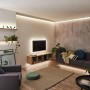 Wohnzimmer mit indirekter Beleuchtung durch Paulmann MaxLED RGBW LED-Streifen.
