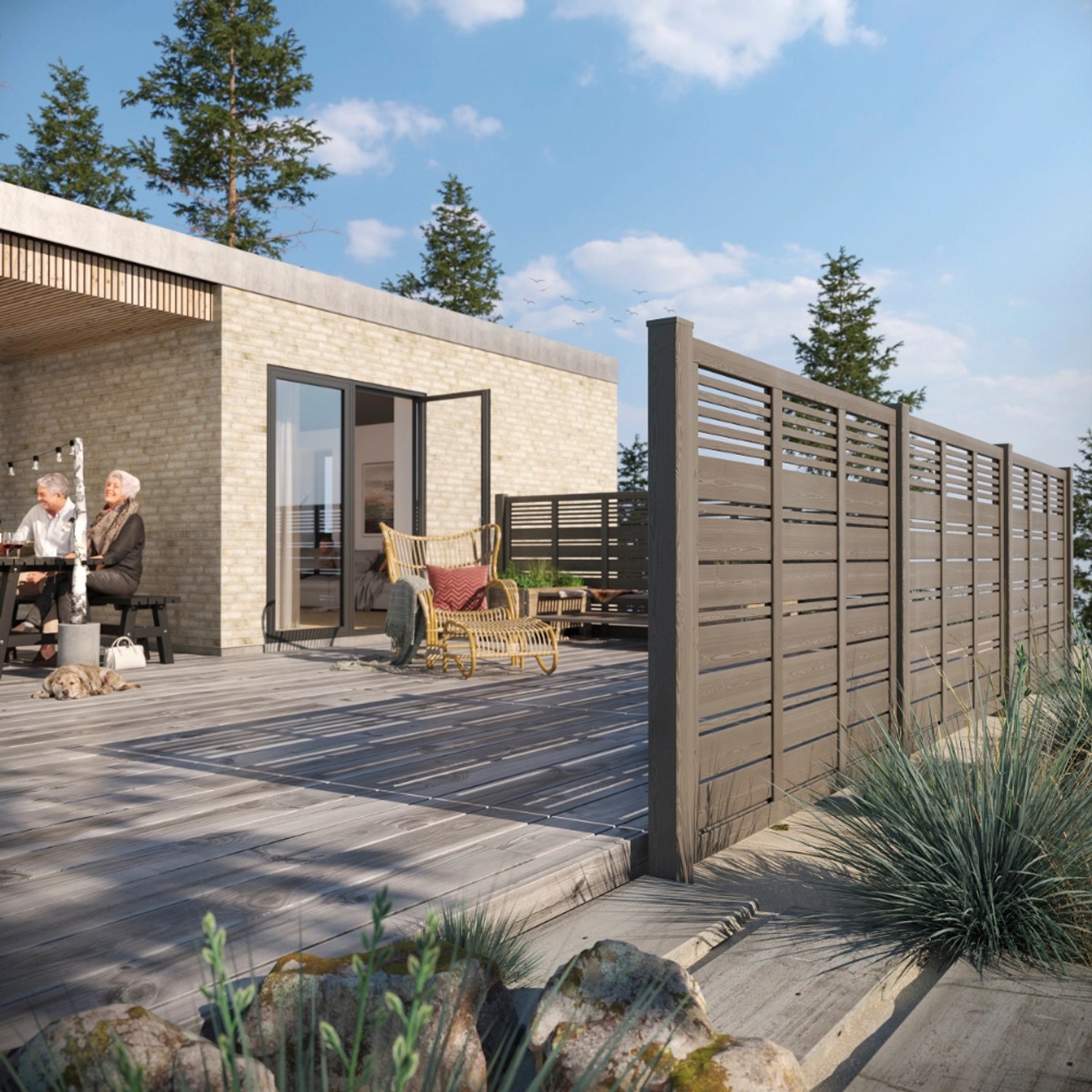 Umbragraue Pfostenkappe Classic 91x91 mm auf Zaunpfosten im Garten.