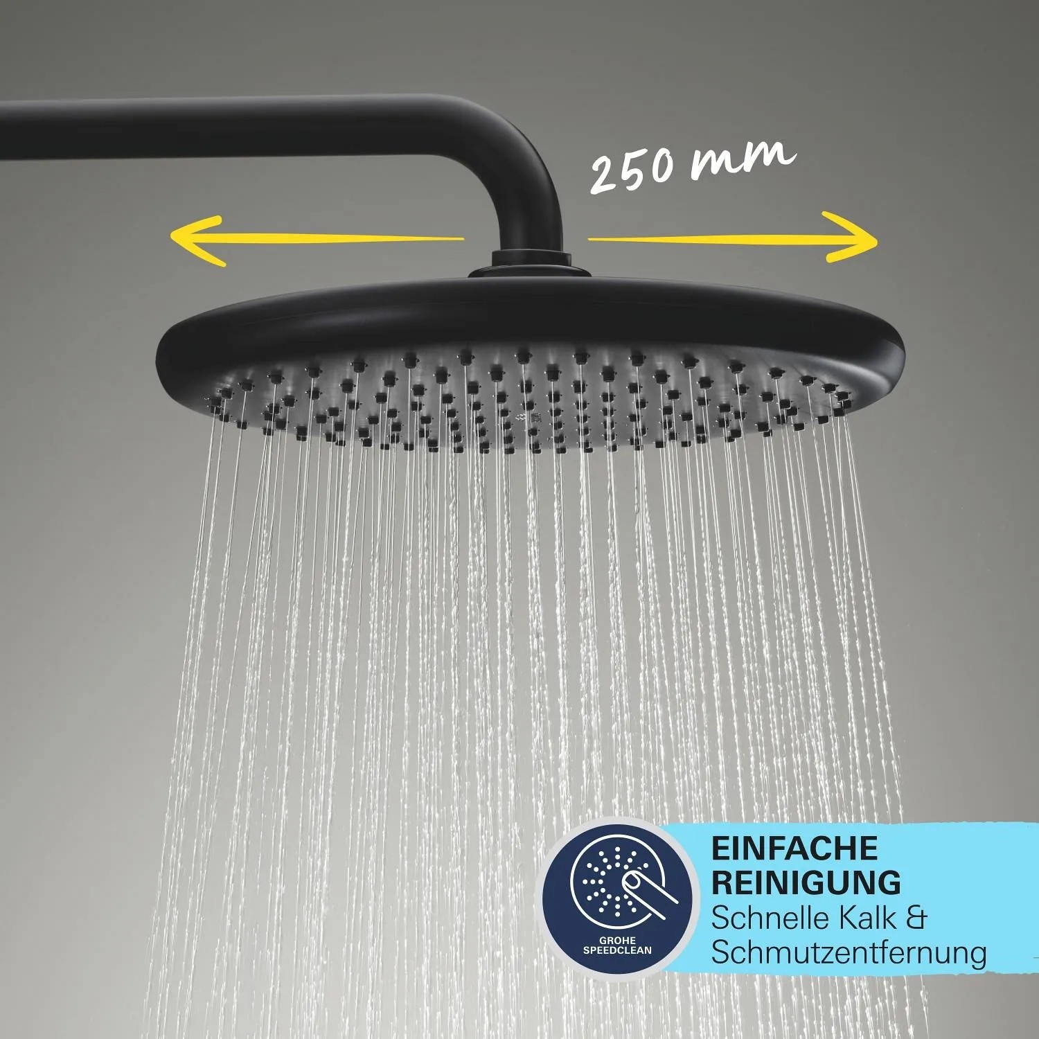Grohe Vitalio Start 250 Kopfbrause, schwarz matt, mit Wasserstrahl und Hinweis zur einfachen Reinigung.