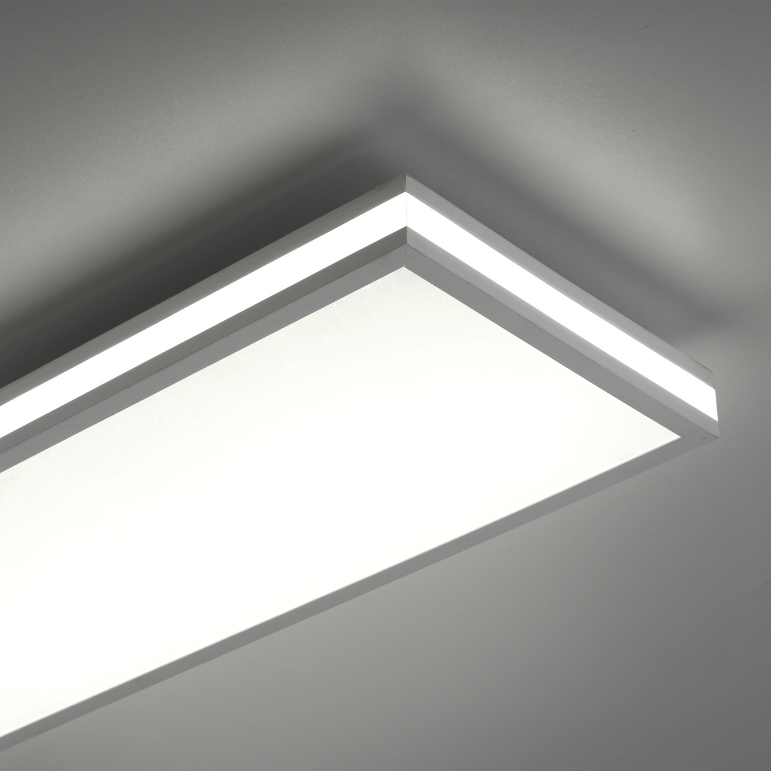 Weißes, dimmbares Just Light LED-Panel Mario, 100x25 cm, mit Farbwechsel und Fernbedienung.