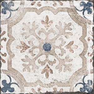 Dekorative, matte Bodenfliese aus Feinsteinzeug, 20x20 cm, mit floralem Muster in Beige- und Blautönen.
