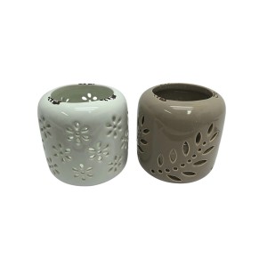 Boltze Windlicht Haug, 2-fach sortiert, beige/weiß, mit floralen/blattförmigen Ausschnitten.