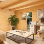 Innenansicht Weka Gartenhaus Amberley mit Doppeltür, eingerichtet als Wohn- und Arbeitsbereich.