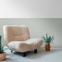 A.S. Creation Vliestapete Wallpanel in Türkis-Beige mit Holzoptik im Wohnraum.