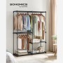 Schwarzer Songmics Kleiderschrank (138x43x182cm) mit Kleidung und Ablagen.