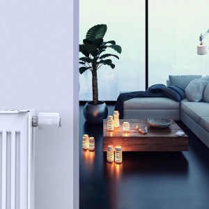 Hama Heizkörperthermostat Smart WiFi in Weiß am Heizkörper montiert.