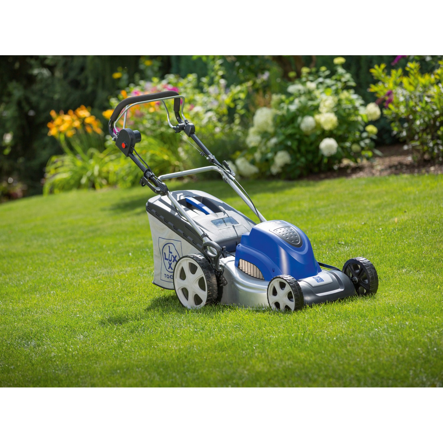 LUX Elektro-Rasenmäher E-1800/46 HM2 auf Rasen. Zubehör und Ersatzteile für Rasenmäher.
