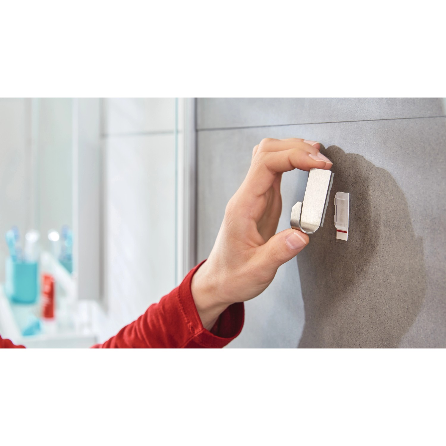 Tesa Powerstrips Haken Waterproof Zoom Edelstahl Small (2 Stück) im Badezimmer.