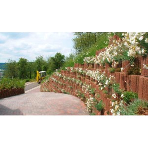 Hangflor Pflanzringe in Braun bepflanzt zur Hangbefestigung im Garten.