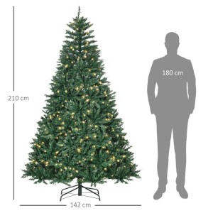 Grüner künstlicher Weihnachtsbaum mit warmweißen LEDs, 210 cm hoch, 142 cm breit, Metallständer. Realistisches Design, neben Person.