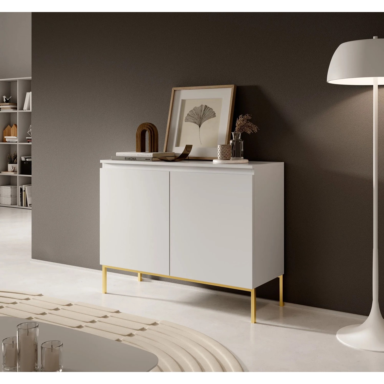 Modernes weißes Sideboard Bemmi, 100 cm, mit grifflosen Türen und goldenen Beinen im Wohnzimmer.