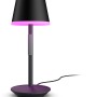 Schwarze Philips Hue Go Tischleuchte mit farbigem Licht für Innen & Außen.