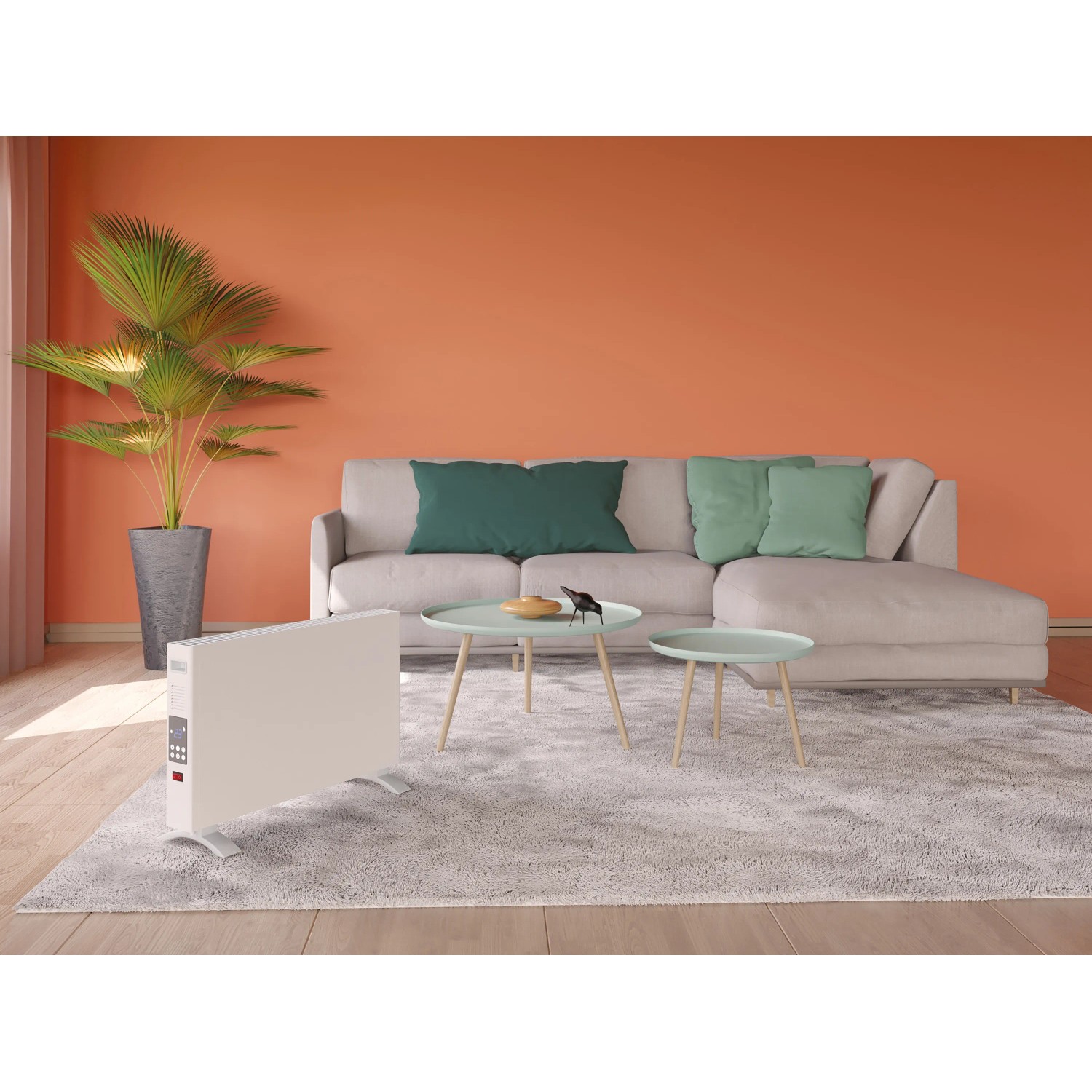 Weißer Digital-Konvektor Hitra 2000 W im Wohnraum mit Sofa und Teppich.