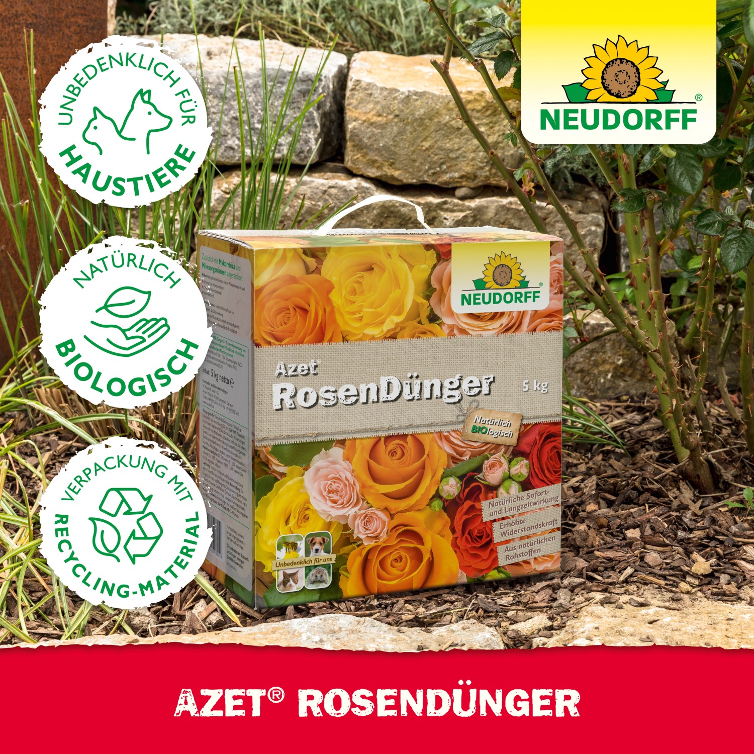 Neudorff Azet Rosen-Dünger 1 kg Packung vor Steinmauer und Rosen.
