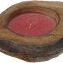 Duftkerze in Kokosnussschale, rote Kerze. Dekorative Kerze für ein gemütliches Ambiente.