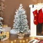 Kompakter, verschneiter Kunststoff-Weihnachtsbaum (90 cm) mit Leinenfuß als festliche Weihnachtsdekoration.