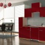 Respekta Küchenzeile KB180ESR in Rot-Eiche Optik mit Spüle, Kochfeld und Kühlschrank.