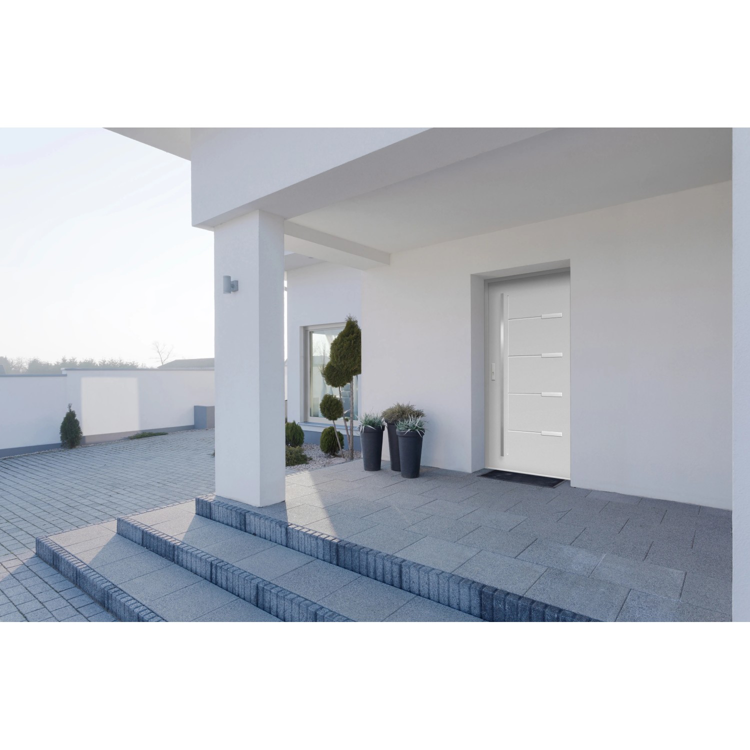 Graue Haustür Thermospace Oslo Prime (100x210 cm) mit Linksanschlag in Hauseingang.