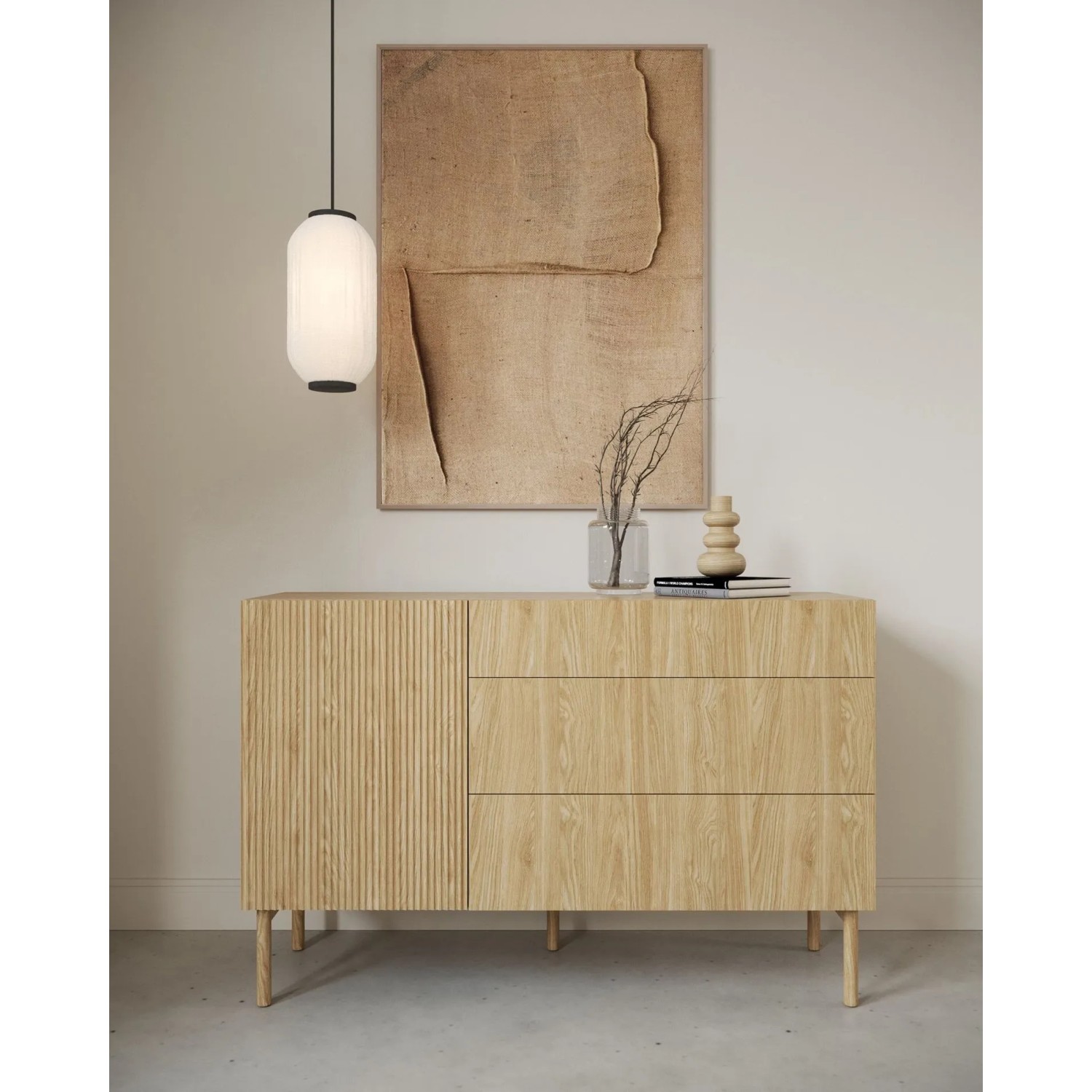Selsey Sideboard Nolie aus geölter Eiche mit geriffelter Tür, drei Schubladen und Holzbeinen.