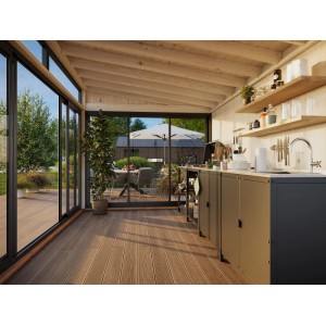 Innenansicht: Palmako Holz-Gartenhaus mit Pultdach, hellbraunes Holz, große Fensterfront, Küchenzeile.