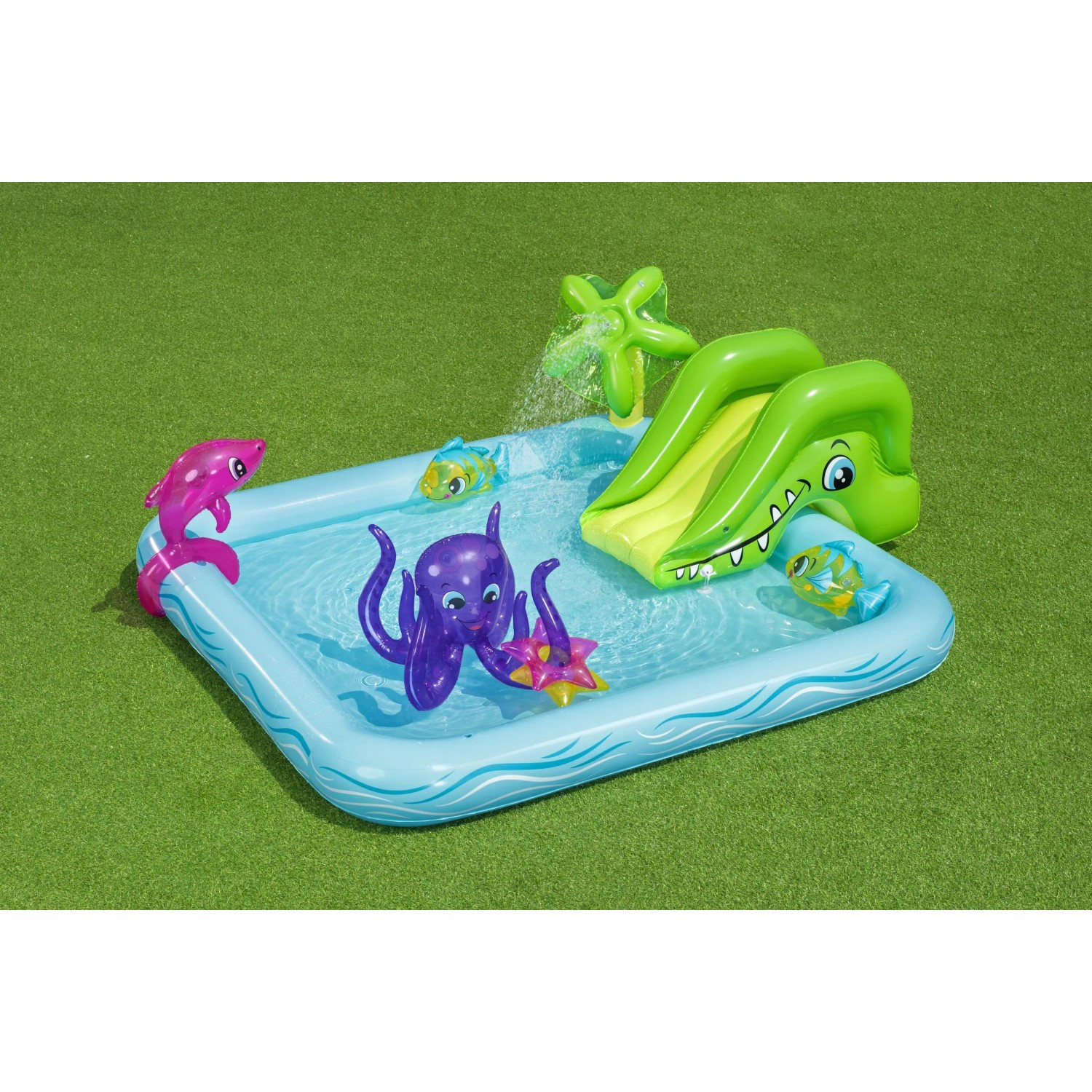 Bestway Wasserspielcenter Aquarium mit Rutsche, Delfin, Oktopus und Clownfischen auf Rasen.