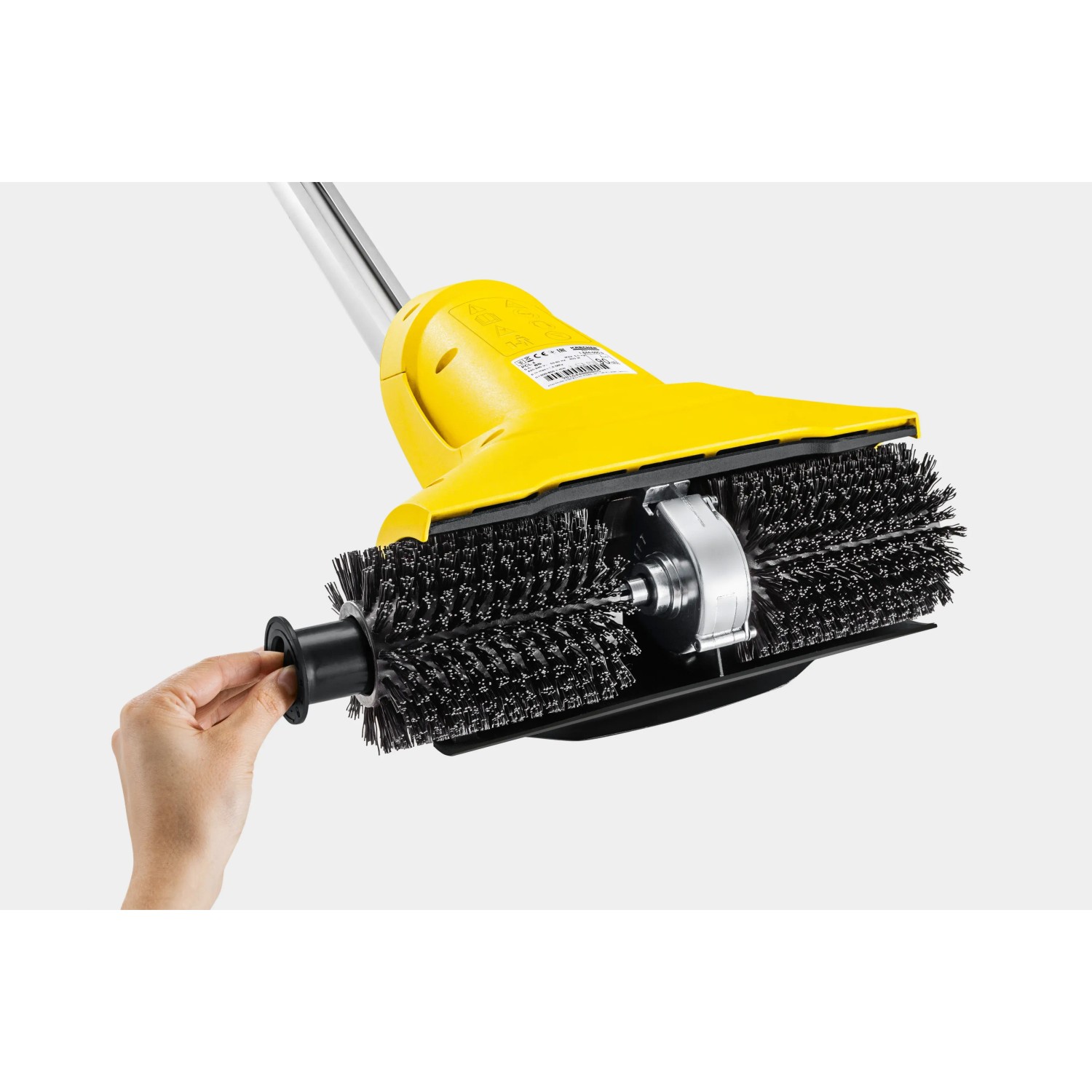 Kärcher PCL 4 Terrassenreiniger: Gelber Flächenreiniger mit rotierenden Bürsten im Detail.