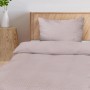 Beautissu Seersucker Bettwäsche 4tlg. 135x200 cm in Taupe auf einem Bett.