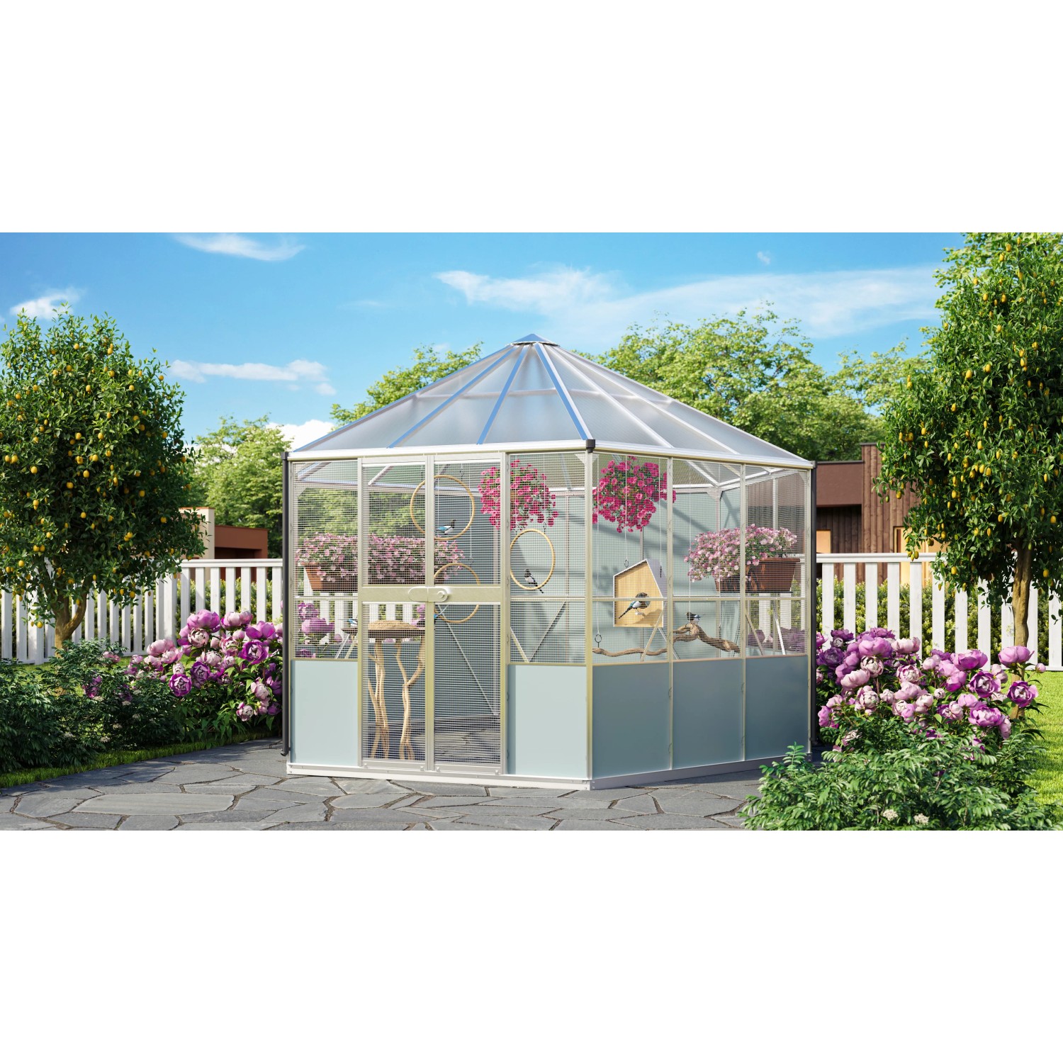 Vitavia Vogelvoliere Circus 9000 aus Aluminium im Garten mit Pflanzen und Vogelhaus.