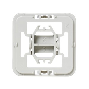 Grauer Homematic IP Adapter für Kopp Schalter. Quadratischer Kunststoffrahmen zur Integration in Hausautomation.