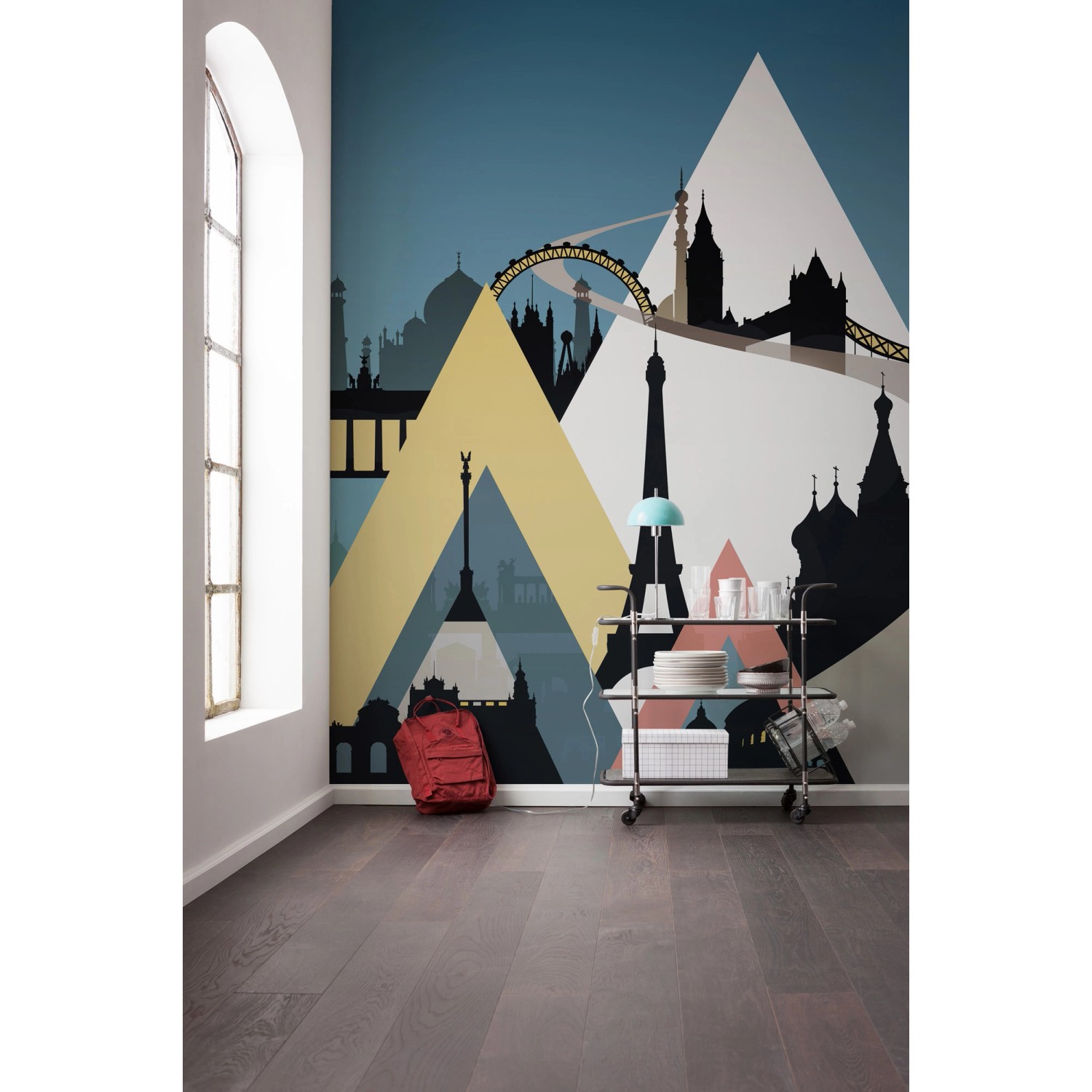 Komar Vliesfototapete Sightseeing mit Skyline-Motiv in verschiedenen Farben.