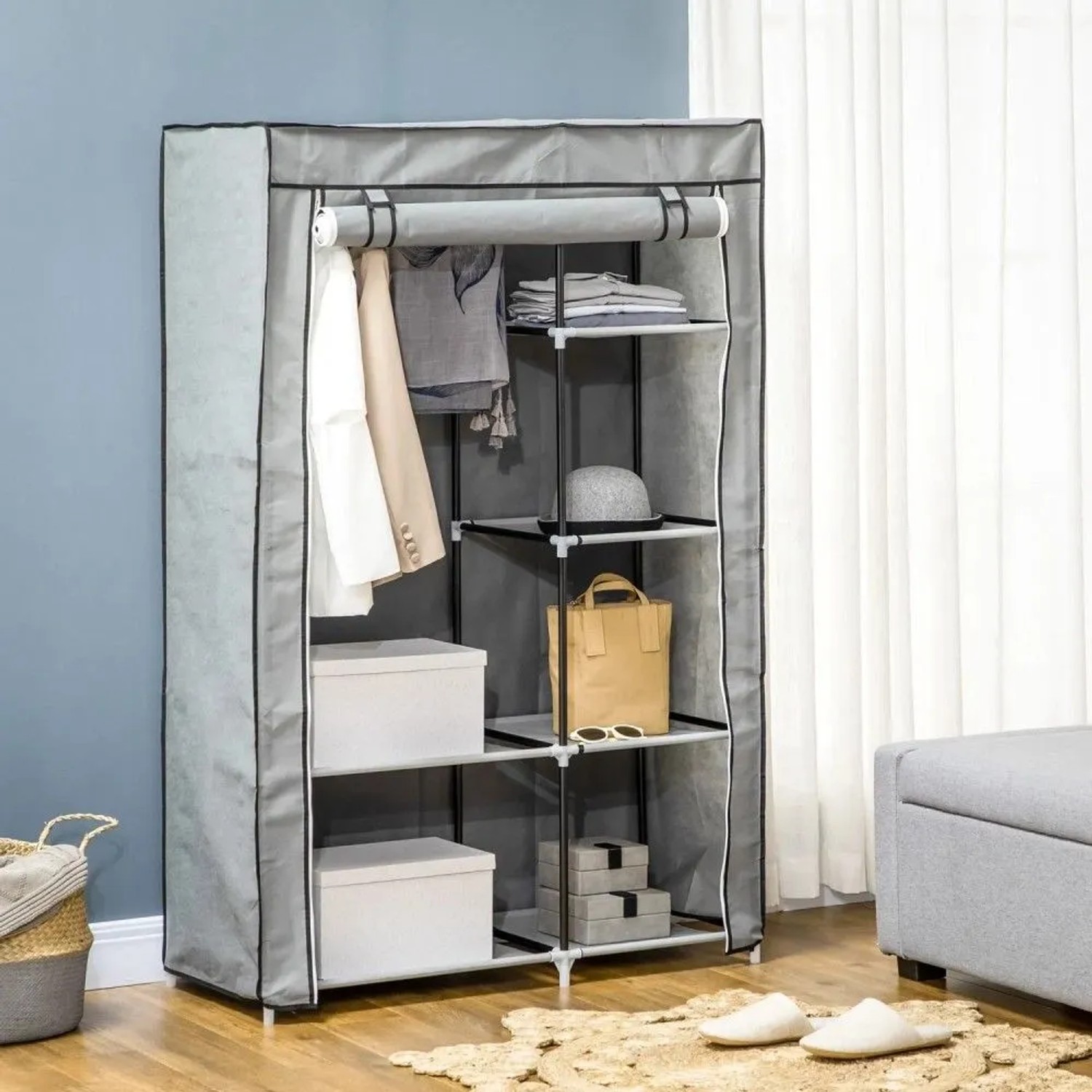 Grauer HOMCOM Falt-Kleiderschrank mit Kleiderstange und 6 Fächern, gefüllt mit Kleidung und Aufbewahrungsboxen.