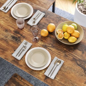Gedeckter Songmics Bartisch LBT91X in Braun-Schwarz mit Geschirr und Obstschale.