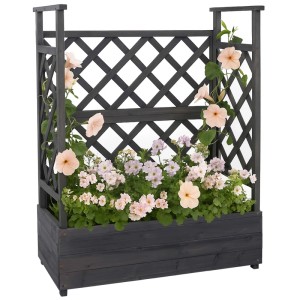 Anthrazit-graues Hochbeet mit Rankhilfe aus Holz, bepflanzt mit rosa und weißen Blumen.