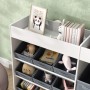 Weißes AIYAPLAY Kinderregal aus MDF mit grauen Stoffboxen, gefüllt mit Spielzeug und Büchern. Ideal für Kinderzimmer.