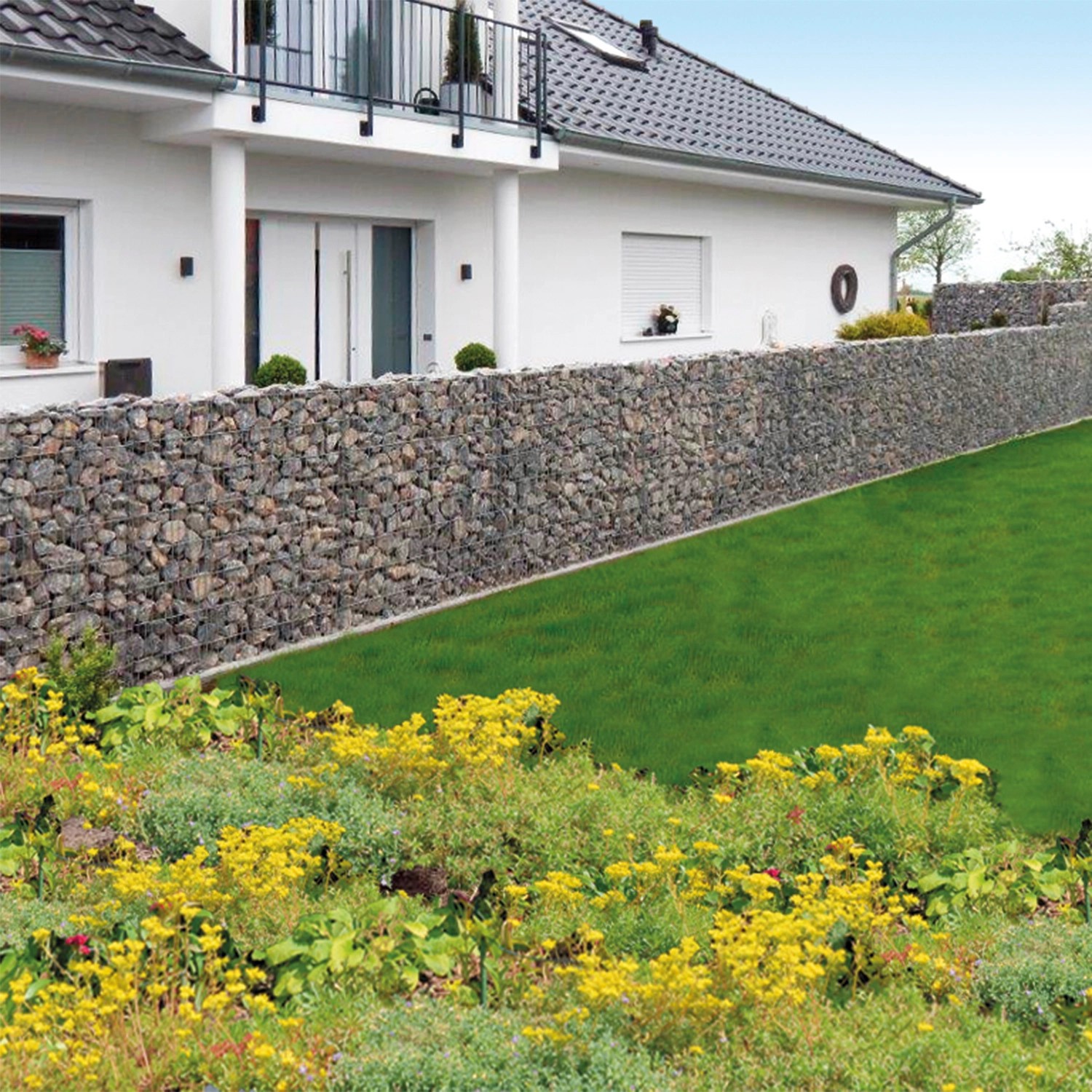 Gabionen-Basisbausatz Limes als flexible Gartenmauer/Sichtschutz, gefüllt mit grauen Steinen.