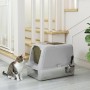 Hellesgraues geschlossenes Katzenklo aus Edelstahl und Kunststoff mit Katze und Schaufel im Wohnbereich.